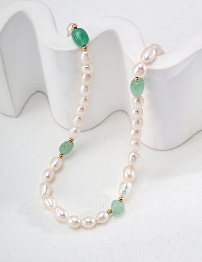 Elegant Pearl Necklace with Green Jade Accents