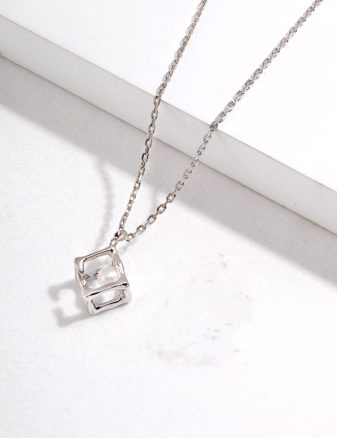 Geometric Hollow Square Pendant Necklace with Pearl Centerpiece