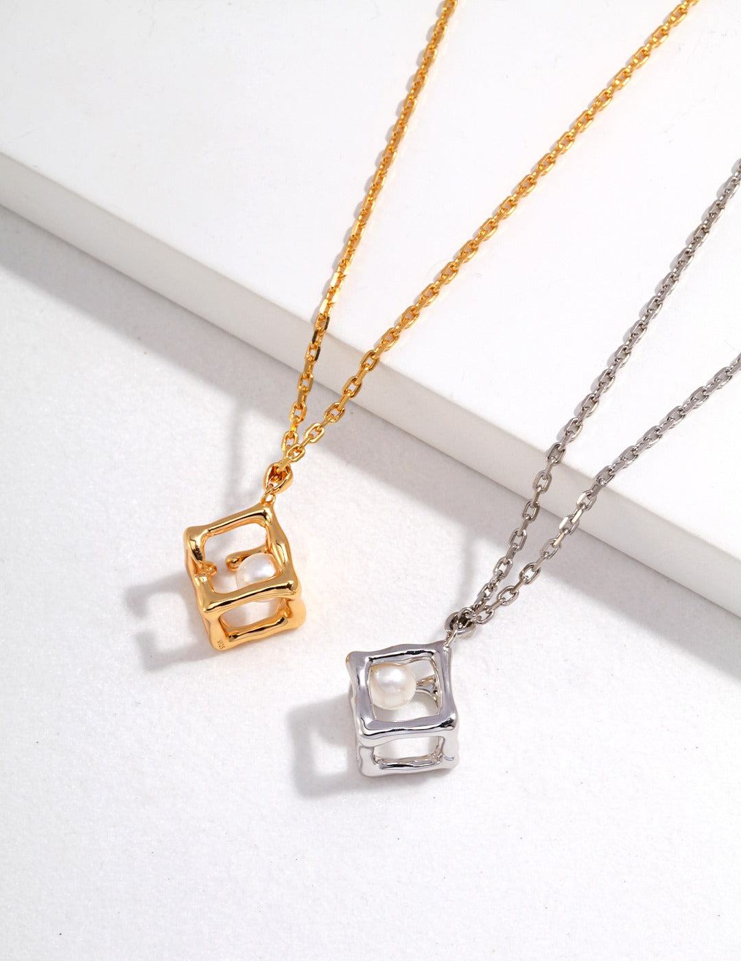 Geometric Hollow Square Pendant Necklace with Pearl Centerpiece