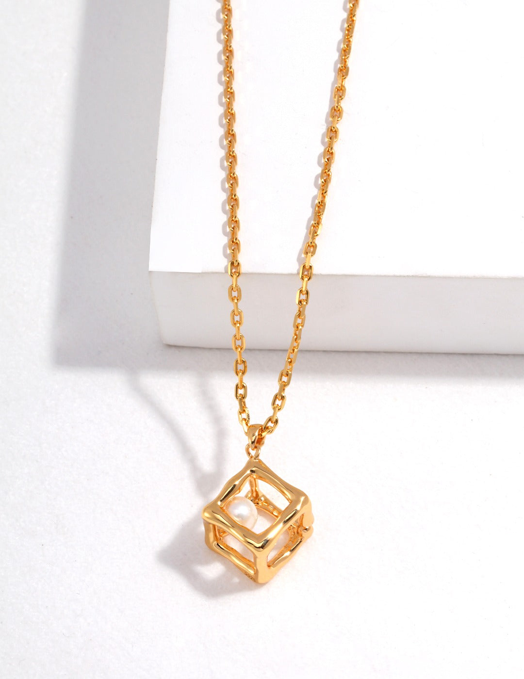 Geometric Hollow Square Pendant Necklace with Pearl Centerpiece