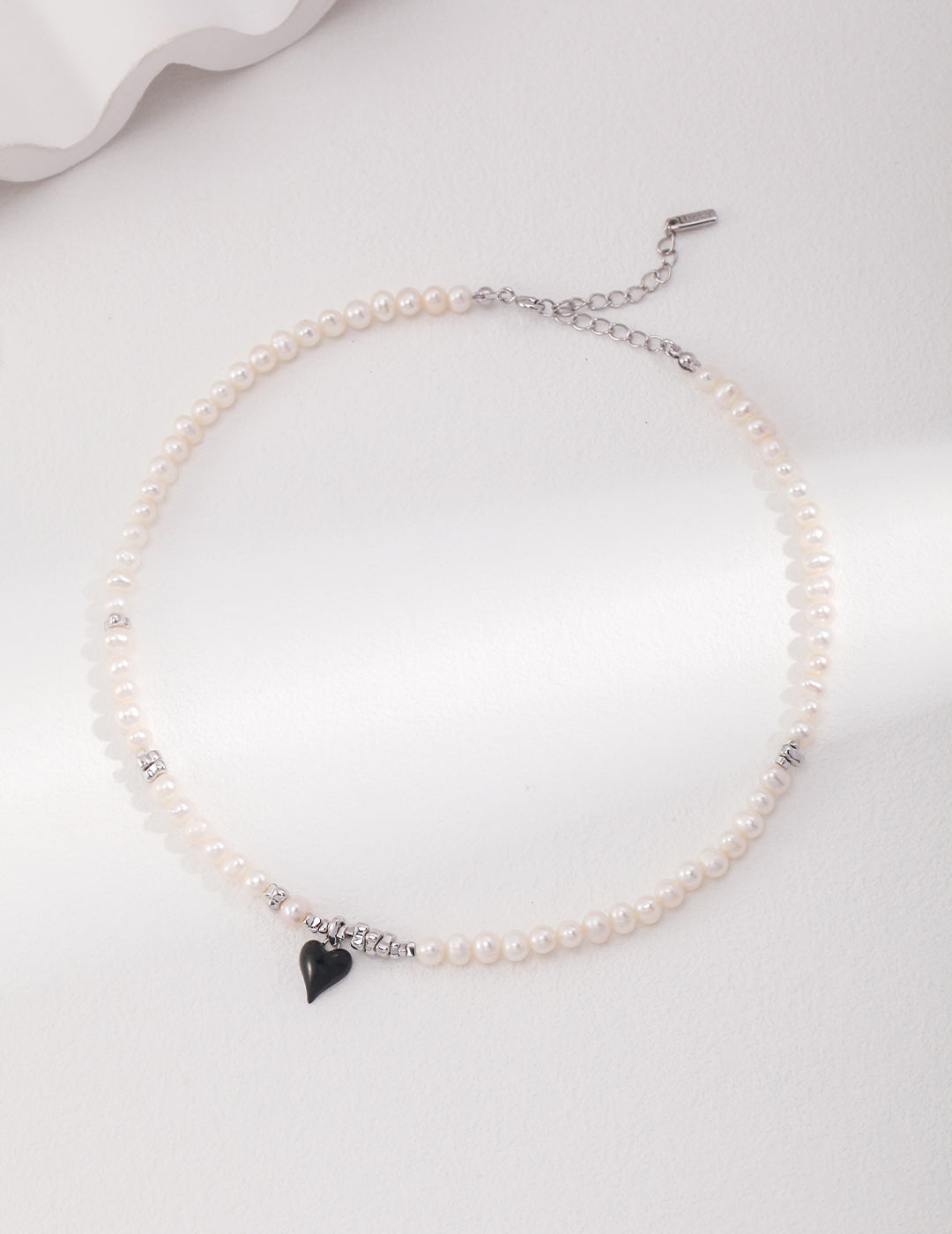 Freshwater Pearl Necklace with Unique Black Heart Accent