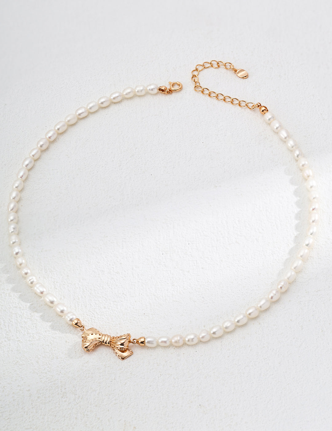 Classic Pearl Necklace with Bow Charm - Perfect for Any Occasion