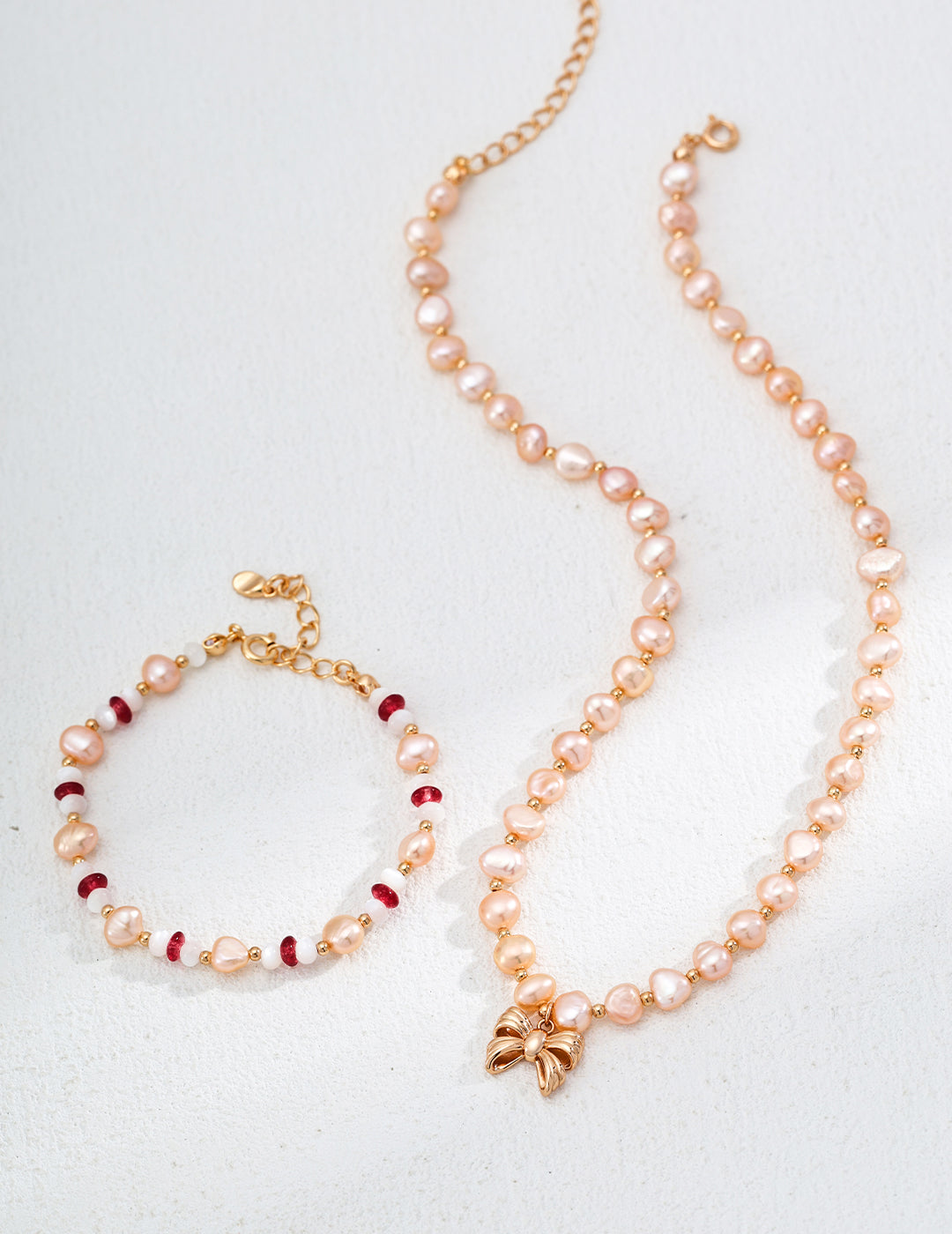 Elegant Pink Pearl Necklace with Gold Butterfly Pendant