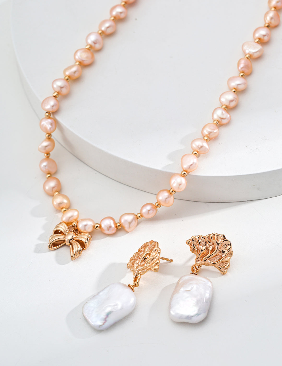 Elegant Pink Pearl Necklace with Gold Butterfly Pendant