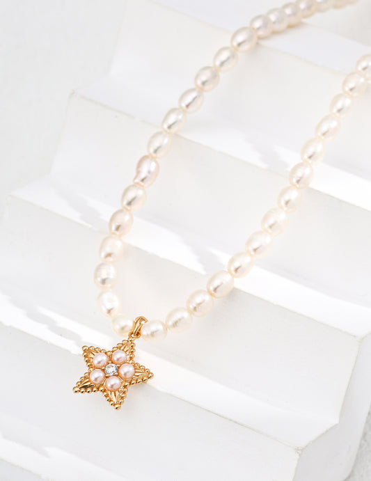 Elegant Pearl Necklace with Gold Star Pendant