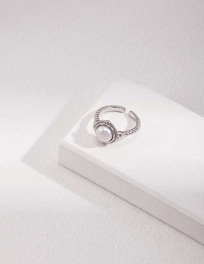 Sterling Silver Twist Ring with Classic Pearl Setting