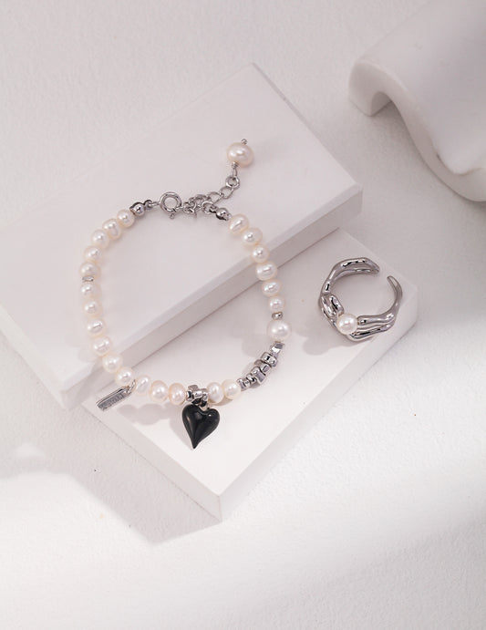 Classic Pearl Bracelet with Black Heart Charm - A Modern Twist