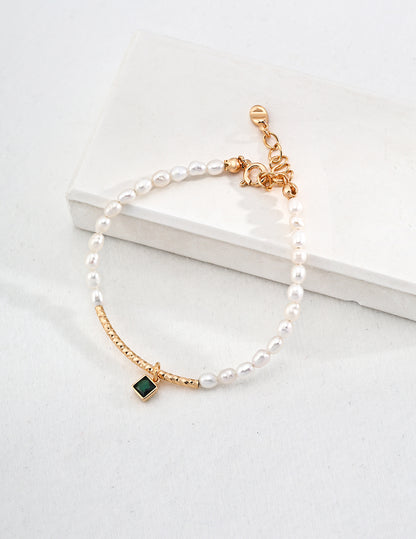 Nature Rice-shaped Pearl Bracelet with Green Cubic Zircon Pendant